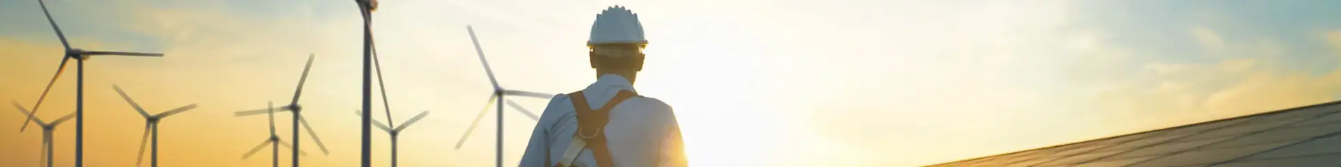 Wind turbines in a renewable energy farm during sunset, symbolizing sustainable energy production and eco-friendly technology for green power solutions.