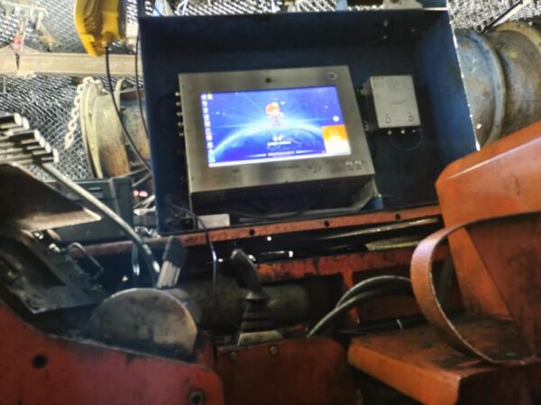 Control system with touchscreen interface for Zaozhuang mine project operations.