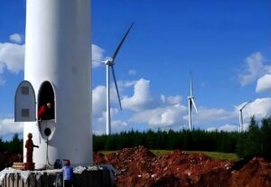 Wind turbines at Xinjiang wind farm generating renewable energy in China.