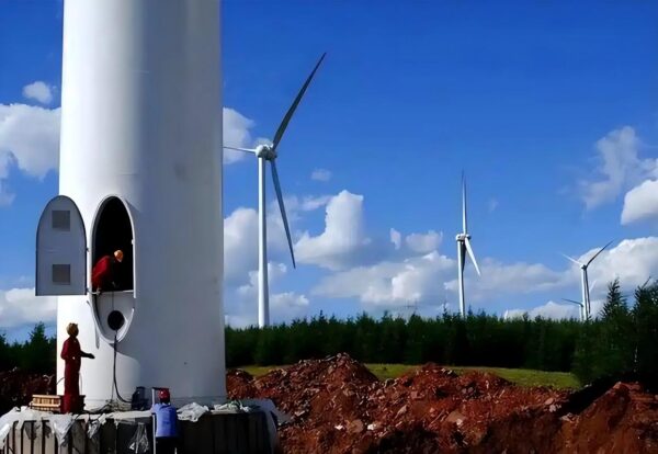 Wind turbines at Xinjiang wind farm generating renewable energy in China.