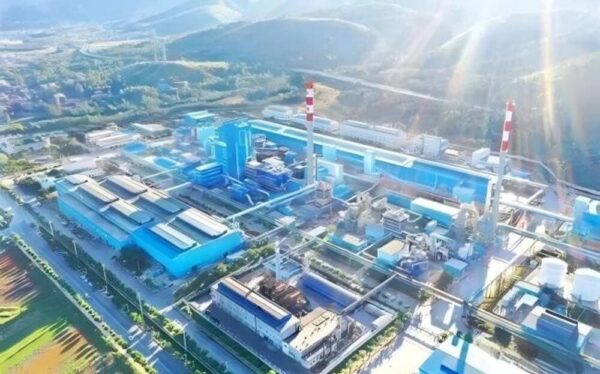 An aerial view of the Yunnan Datun Tin Mine's underground emergency broadcasting system, showcasing the industrial facilities and infrastructure used for safety communication in mining operations.
