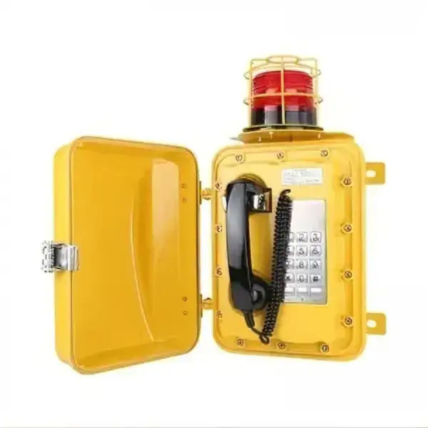 Waterproof industrial telephone with loudspeaker and flashlight for harsh environments.