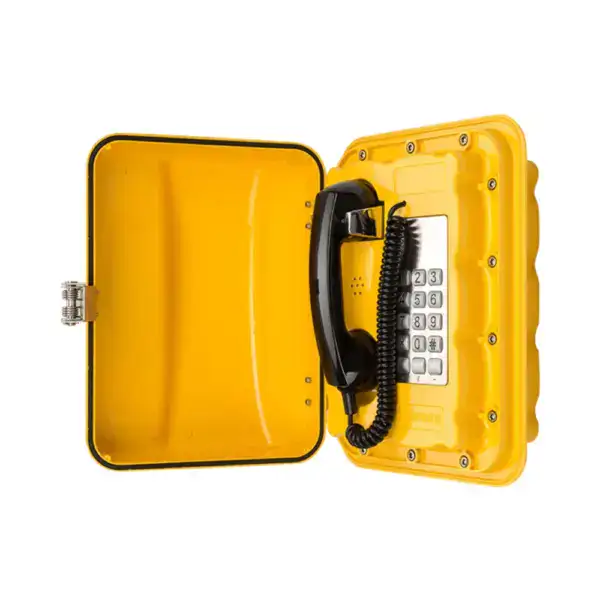 Waterproof industrial telephone with rugged yellow casing, designed for mining environments. Features a durable handset and secure mounting for reliable communication in harsh conditions.