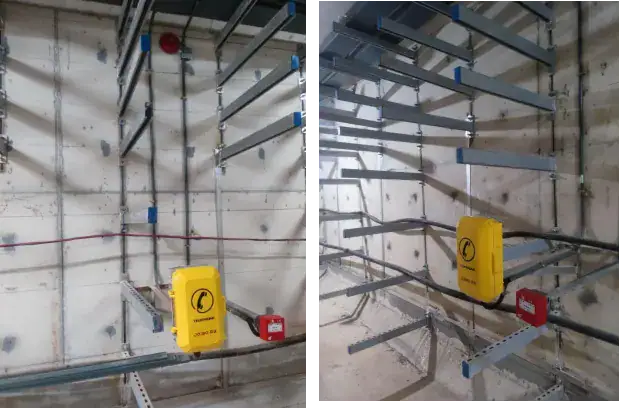 Weatherproof industrial telephone installed in a tunnel environment for reliable communication.