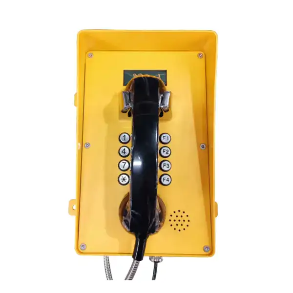 Weatherproof outdoor VoIP SIP telephone with LCD display, rugged yellow housing, and durable design for emergency communication in harsh weather conditions.