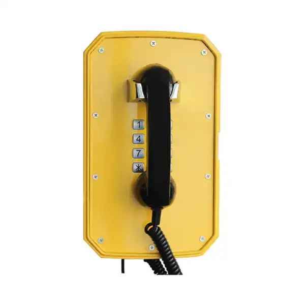 Rugged weatherproof telephone designed for construction sites, featuring a durable yellow casing, keypad, and handset for reliable communication in harsh environments.