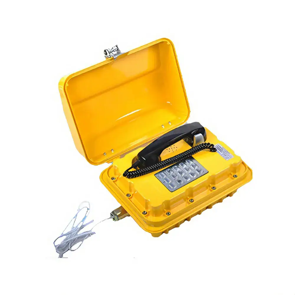 Duty telephone in a yellow protective case, designed for industrial environments. Features a rugged handset, secure wiring, and durable construction for safe communication in hazardous areas.