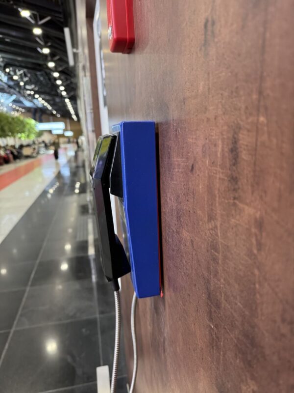 Modern self-service kiosk at Moscow airport for passenger check-in and information, featuring a touchscreen interface and accessible design for travelers.