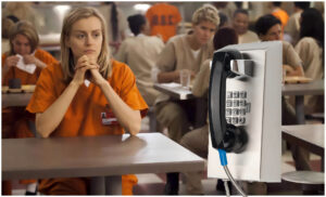 a stainless steel inmate jail phone on a background of jail facility