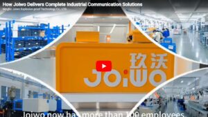 Joiwo industrial communication equipment in a modern factory setting with employees and machinery.