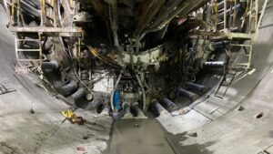 a dusty tunnel construction site with harsh environment