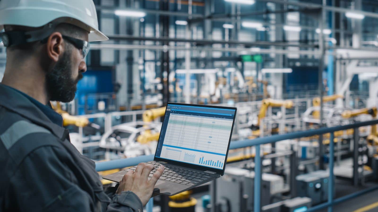 an engineer checking industrial communication systems